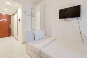 Cozy Living Studio Room at Sky House BSD Apartment By Travelio